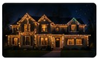 Second nighttime holiday-lighting gallery house photograph.