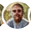 Small circular male customer portrait in the trust strip.